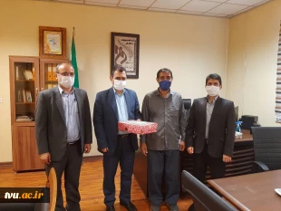 تجلیل از آقای غلامعلی قربانی کارمند خیراندیش دانشگاه فنی و حرفه ای مازندران 3